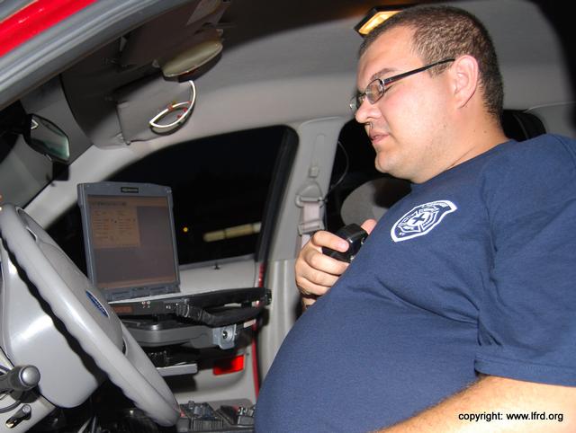 Bill Spicer takes a &quot;power nap&quot; during the physically demanding task of reprogramming radios!!!