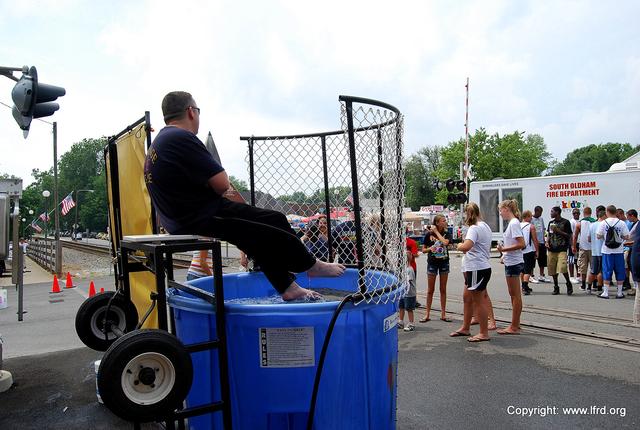 FF Smither taunts the ladies at the Dunking Booth.
